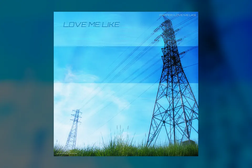 Love Me Like artwork showing power pylons under a blue sky